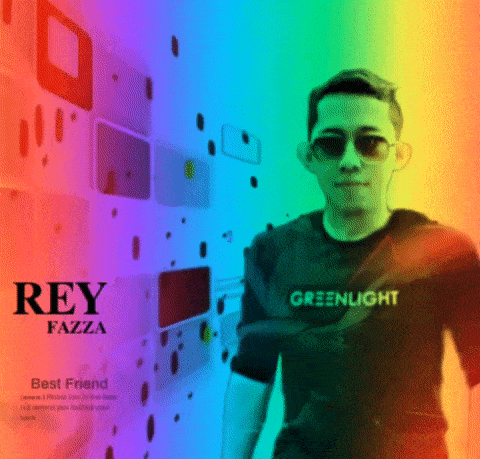 a man wearing sunglasses and a shirt that says greenlight on it