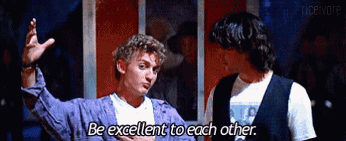 two young men are standing next to each other and one of them is saying be excellent to each other