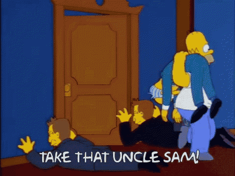 a cartoon of homer simpson standing next to a man laying on the floor saying take that uncle sam .