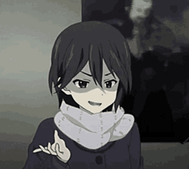 a girl with black hair is wearing a scarf and giving a thumbs up .