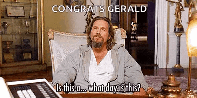 a man is sitting in a chair and saying congrats gerald