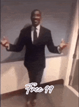 a man in a suit and tie is standing in a hallway with his arms outstretched and the words free 99 below him