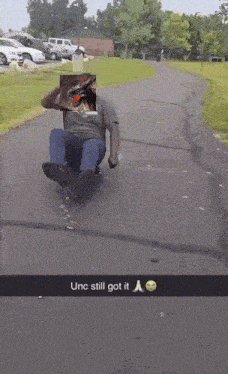 a snapchat of a man riding a skateboard with the caption " unc still got it " on it