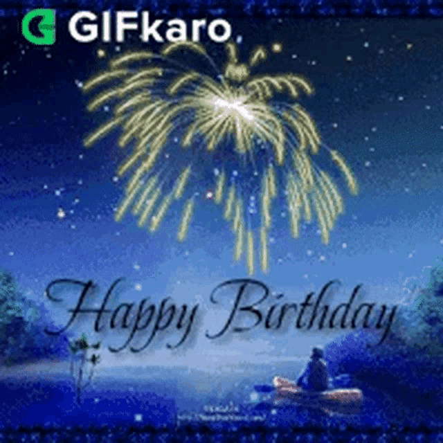 a man is sitting in a boat watching fireworks .
