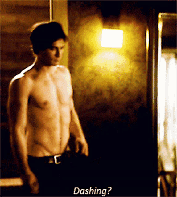 a shirtless man is standing in a dark room with the words dashing written below him