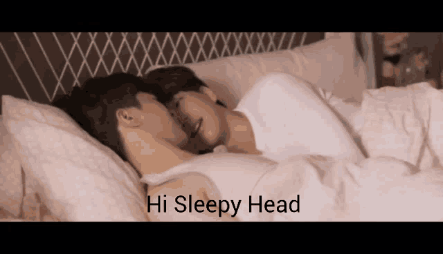 a couple kissing in bed with the words hi sleepy head written below them
