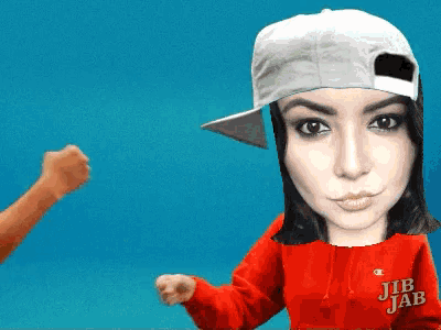 a woman wearing a white hat and a red jib jab hoodie