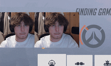 a man is sitting in front of a finding game screen