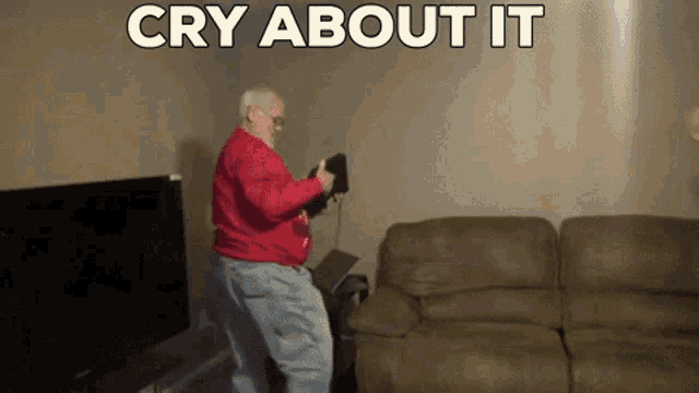 an older man is dancing in a living room with the caption cry about it