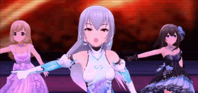 three anime girls are dancing on a stage with one wearing a white top with a s on it