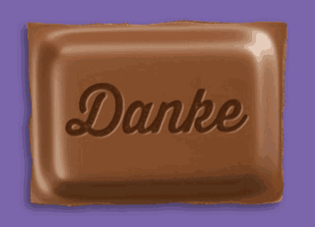 a piece of chocolate with the word danke written on it