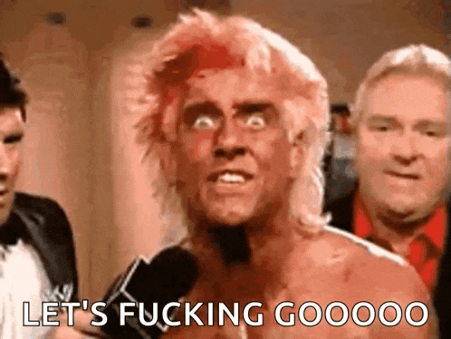 a shirtless wrestler is talking into a microphone and saying `` let 's fucking goooo '' .