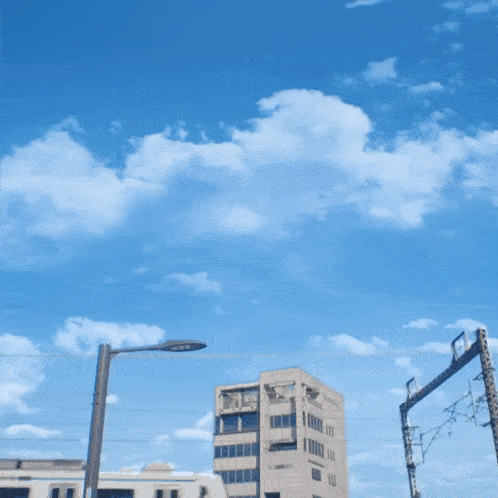 a very tall building with a blue sky behind it