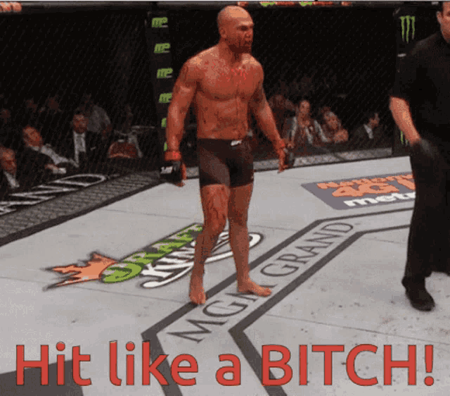 a man in a boxing ring with the words hit like a bitch on the bottom