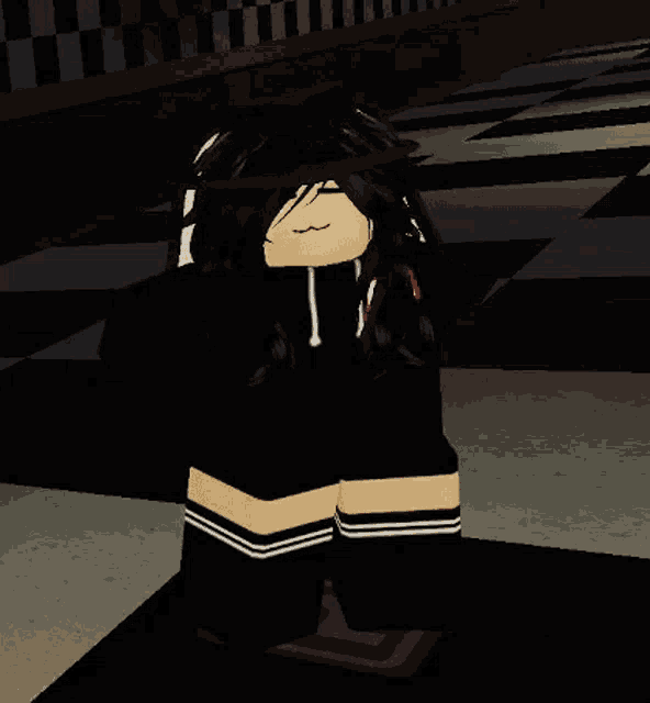 a girl with long black hair is wearing a black hoodie and black knee high socks