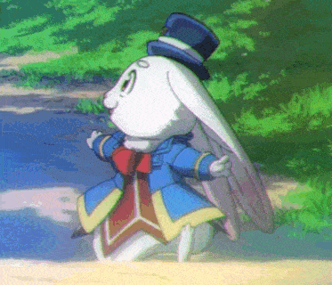 a white rabbit wearing a top hat and a bow tie