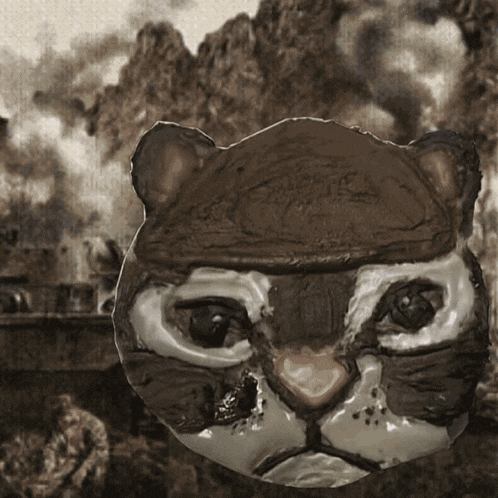 a painting of a cat 's face with a blurred background