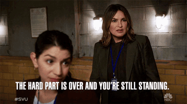 two women standing next to each other with the words " the hard part is over and you 're still standing " above them