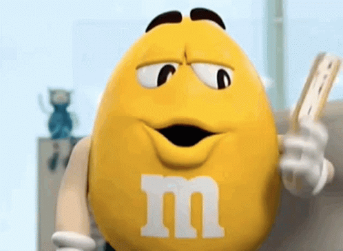M And Ms Yellow GIF - M And Ms Yellow Paper Fan GIFs
