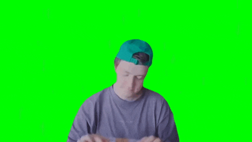 a man wearing a blue hat is holding a 100 euro bill in his hands .