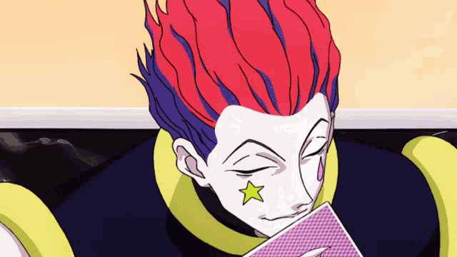 a cartoon character with red hair and a yellow star on his cheek holds a playing card