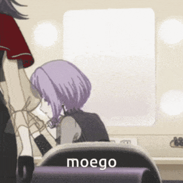 a girl with purple hair is sitting in front of a mirror with the word moego on the bottom right