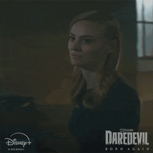 a poster for daredevil born again shows a woman in a black dress