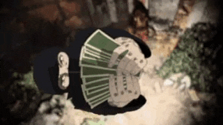 a person wearing a ski mask is holding a bunch of money in their hand .