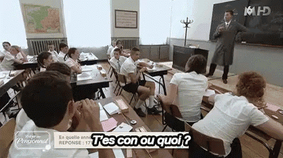 a group of people are sitting at desks in a classroom with a sign that says t'es con ou quoi ?