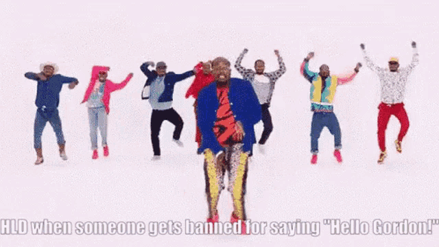 a group of men are dancing in a line with the caption " hd when someone gets banned for saying "