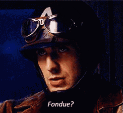 a man wearing a helmet and goggles is asking the question " fondue "