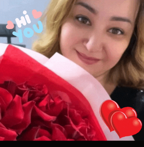 a woman holding a bouquet of red roses with the words hi you written in blue