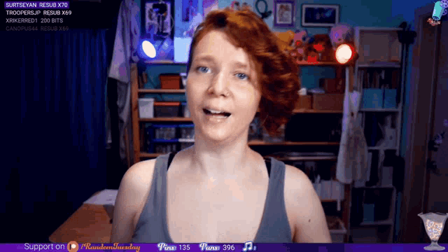 a woman 's face is displayed on a screen with a purple border that says random sunday