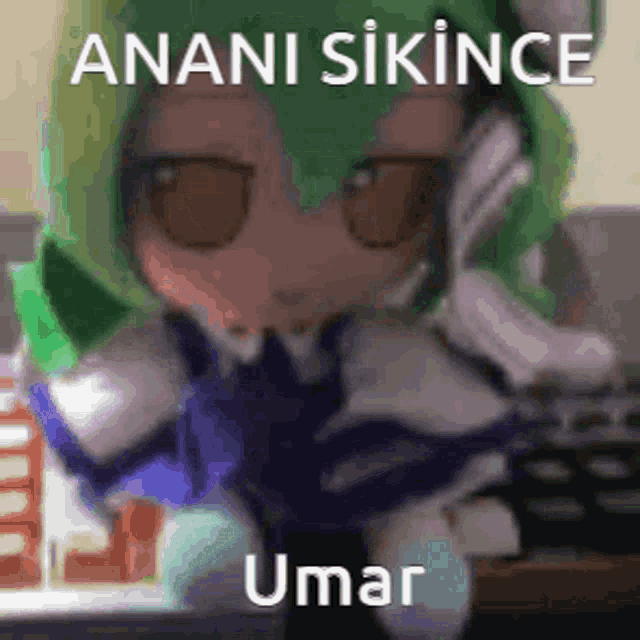 a doll with green hair is sitting in front of a computer with the words ' anani sikince umar ' on the bottom