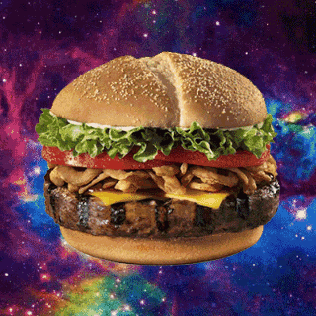 a hamburger with lettuce tomato mushrooms and cheese is floating in space