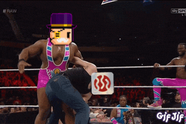 a gif of a wrestling match with the words raw at the top