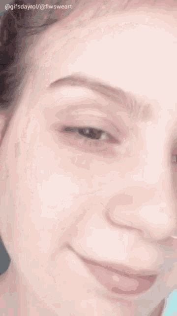 a close up of a woman 's face with the caption gifsdayrol / fwsweart