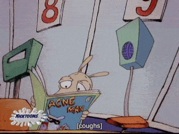 a cartoon character reads a book called acne man