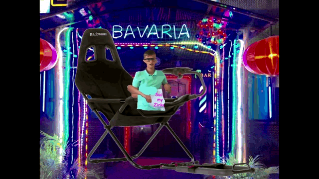a man is sitting in a gaming chair in front of a bavaria sign