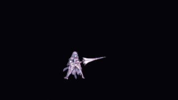 a girl in a white dress holding a sword in a dark room