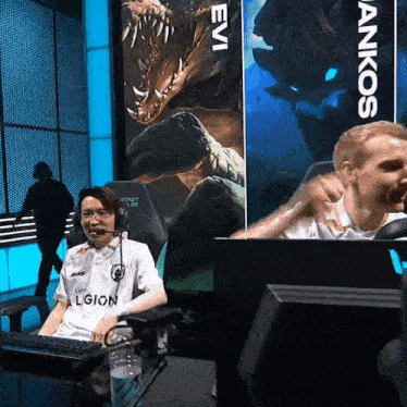 a man wearing a white shirt with legion on it