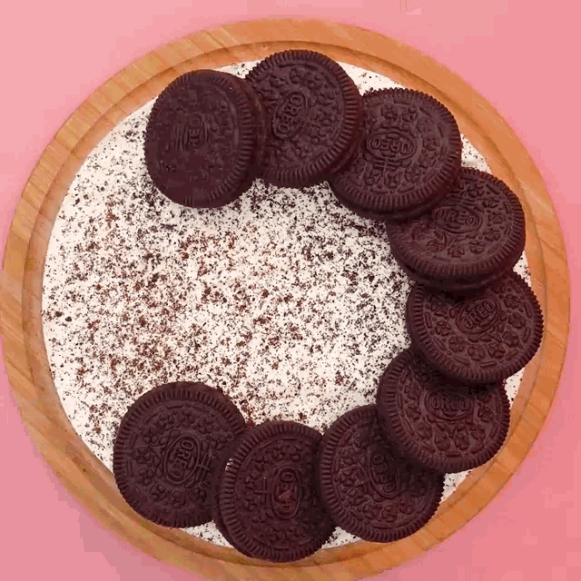 a cake with oreos on top of it