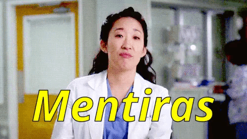 a woman in a lab coat with the word mentiras in yellow