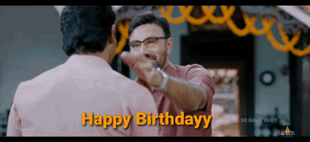 a man giving another man a fist bump with the words happy birthdayy written in orange