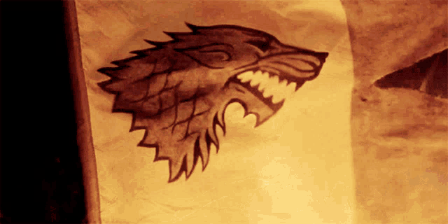 a drawing of a wolf 's head with sharp teeth