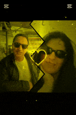 a picture of a man and a woman with sunglasses and a sign that says yalow on it