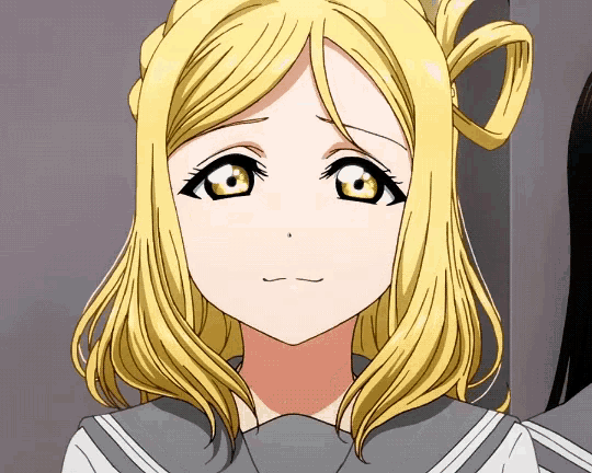 a close up of a blonde anime girl 's face