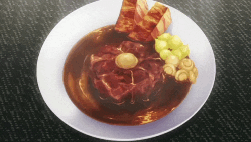 a white plate topped with a large piece of meat