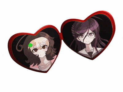a heart shaped picture frame with two anime girls on it
