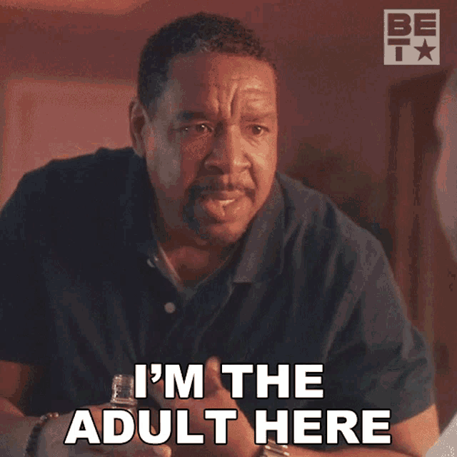 a man says i 'm the adult here in white letters